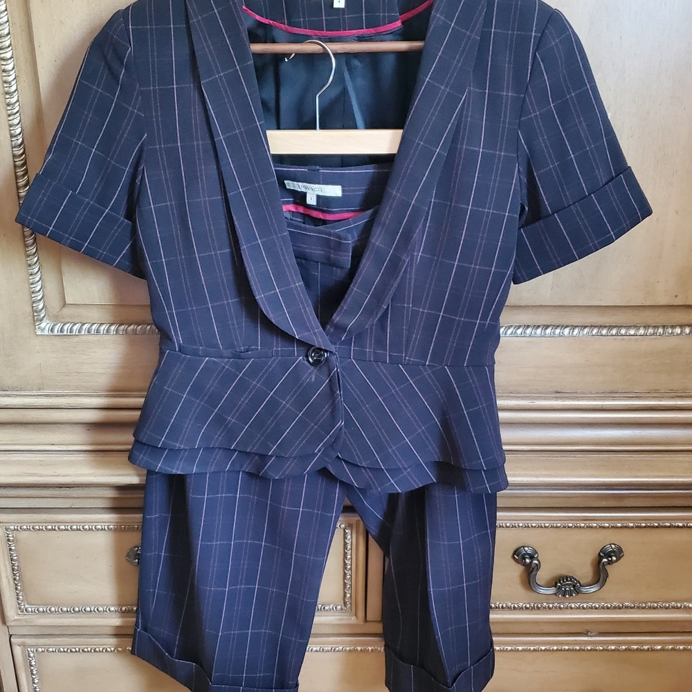 Woman's matching suit- short sleeve jacket and capris pants
